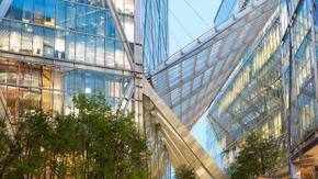 building-with-glass-walls-trees