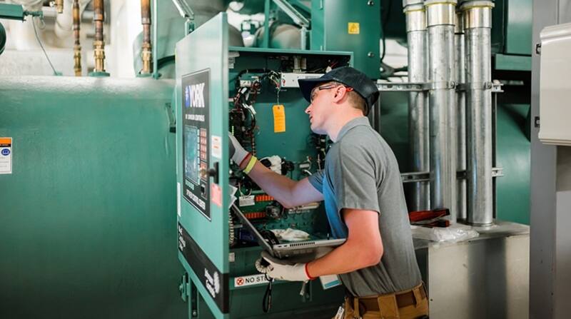 Service technician checking the HVAC