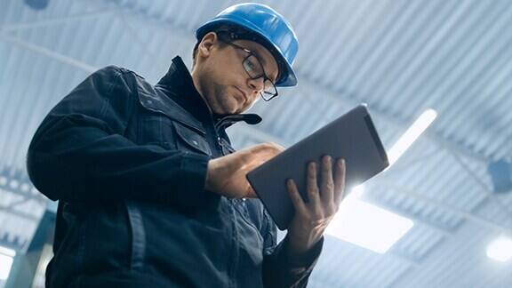 man-looking-tablet